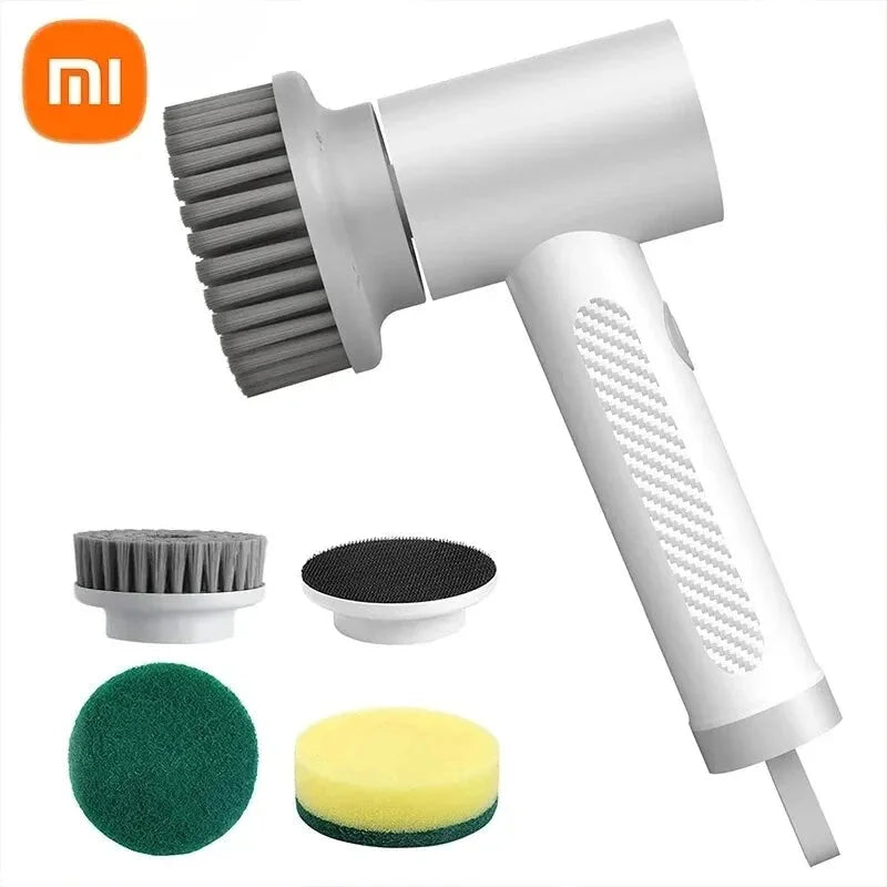 A white hair dryer with a green brush and sponge