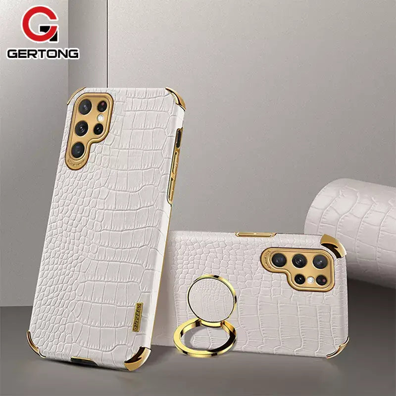 A white iphone case with a gold ring