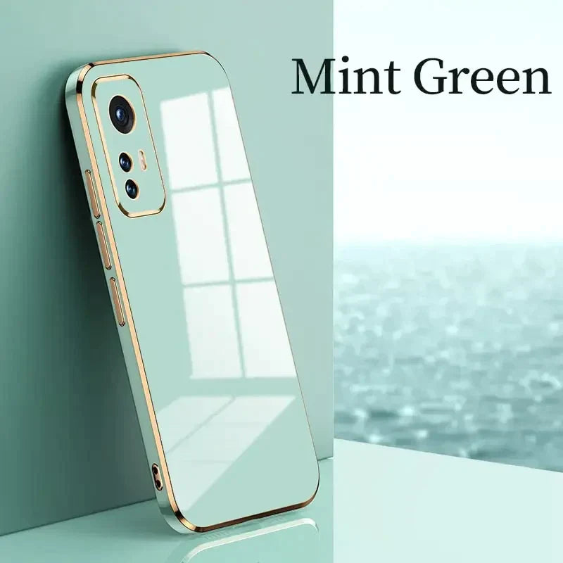 a white iphone case sitting on top of a table