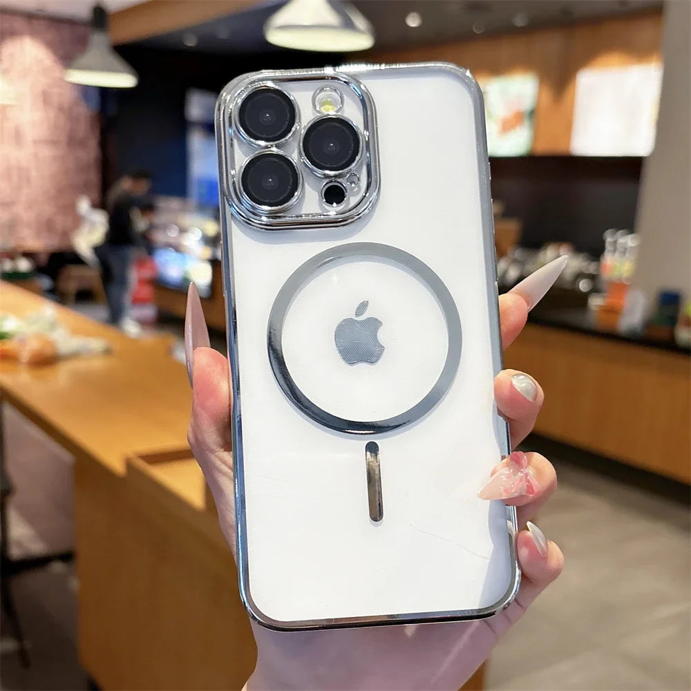 White iPhone with a clear, silver-edged case and a MagSafe ring.