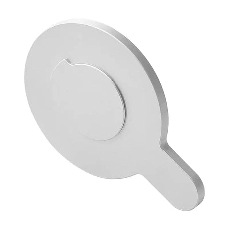 a white paper holder with a circular hole