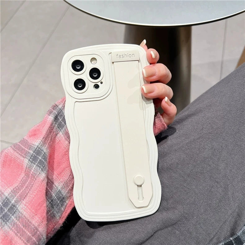 White phone case with hand strap.