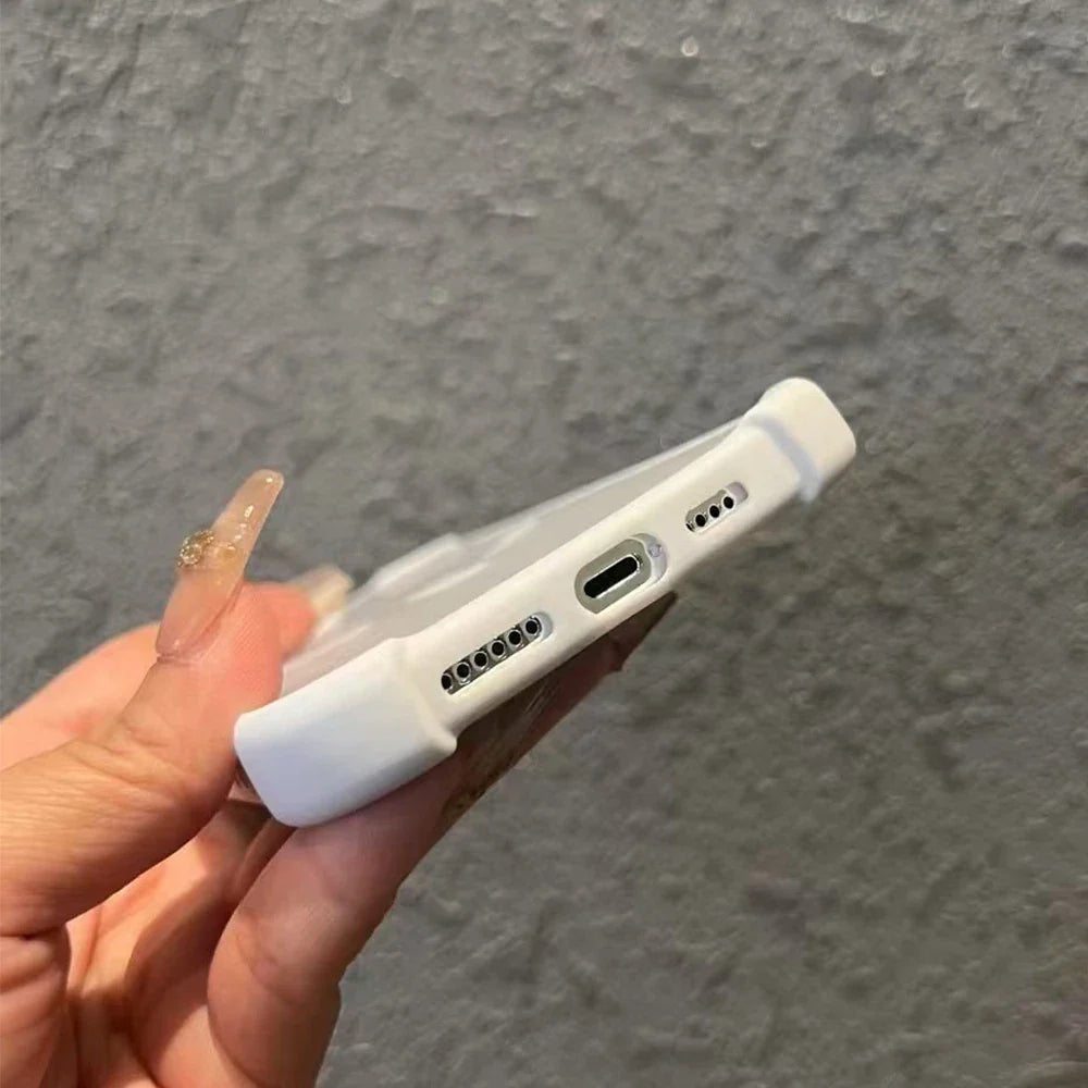 White phone case with port cutouts.