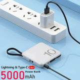 a white power strip with a black cord