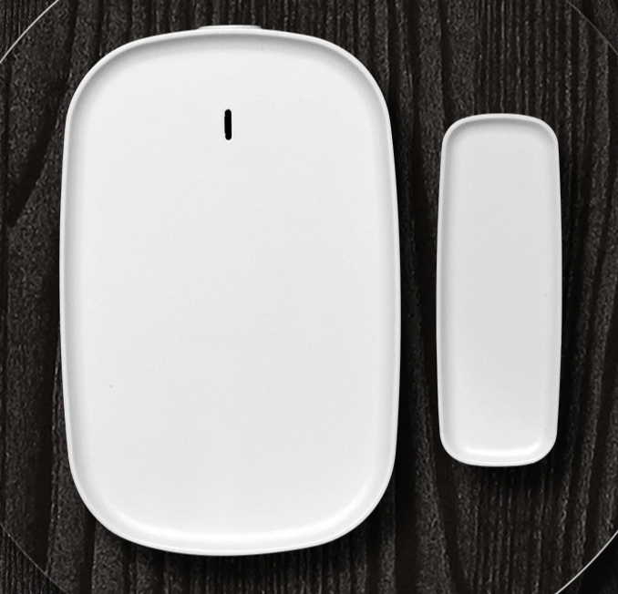 White, rounded, electronic sensor set.