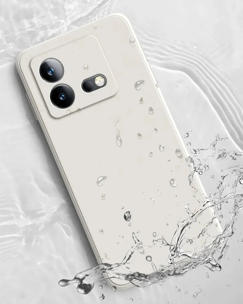 White smartphone with dual rear cameras and water splashing around it.