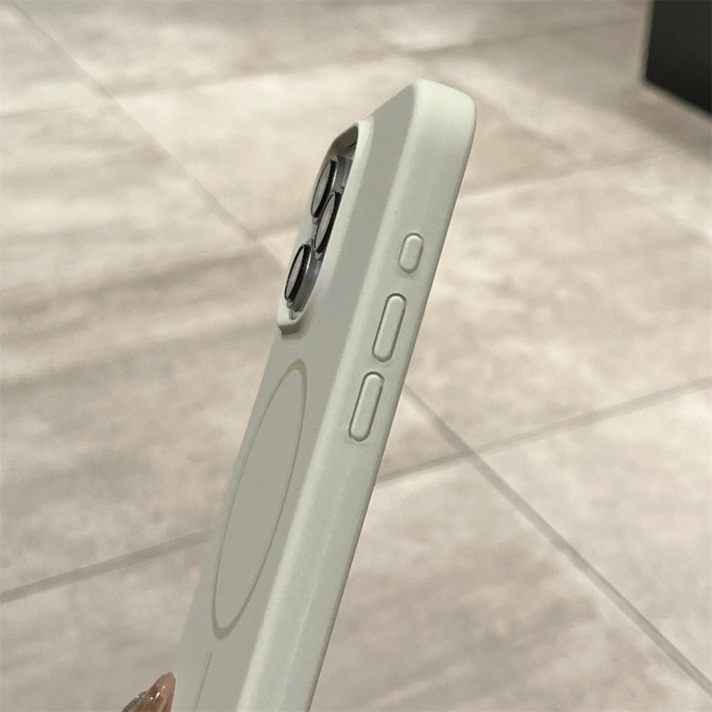 White smartphone in a protective case.