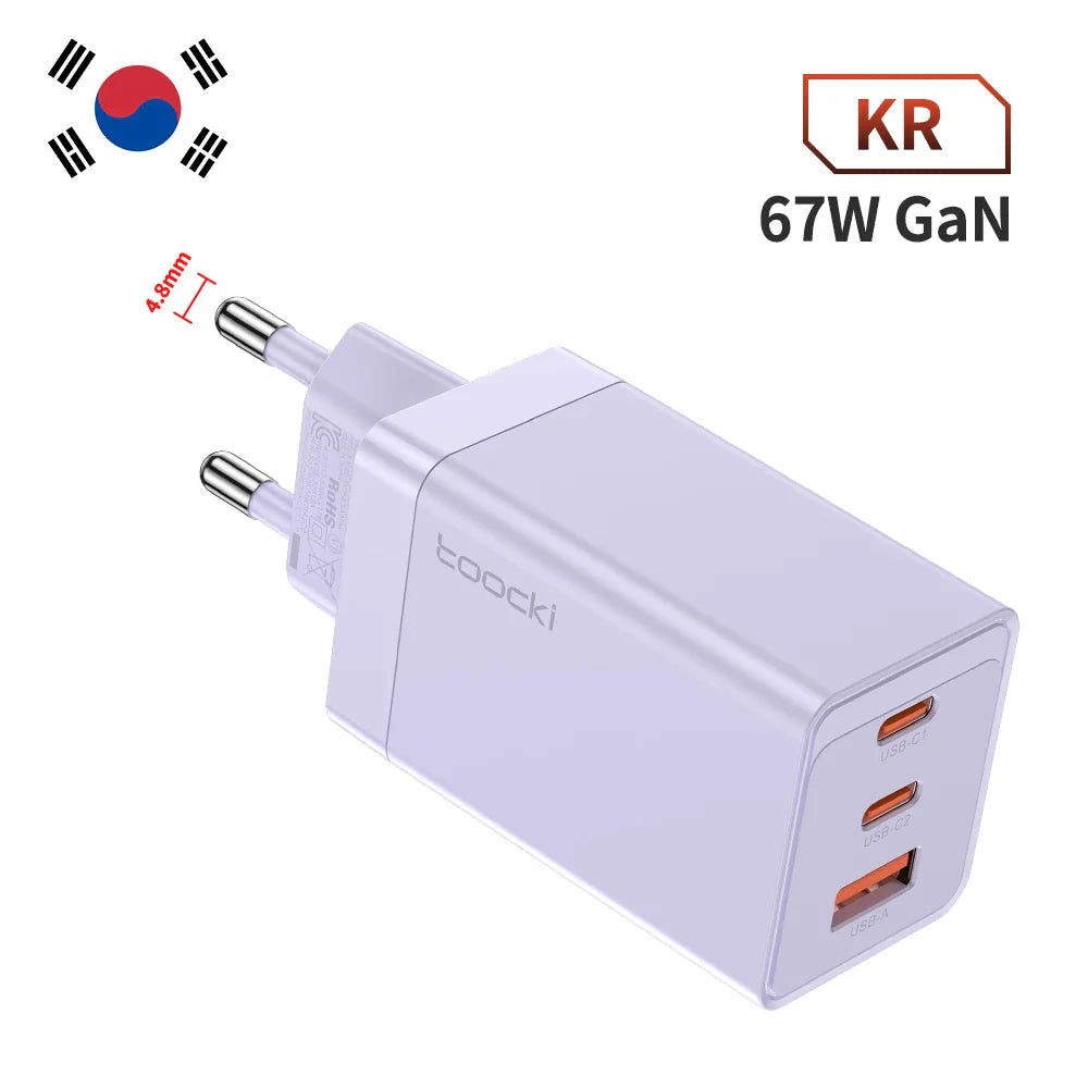 White USB power adapter with three ports, labeled as 67W GaN from Korea.