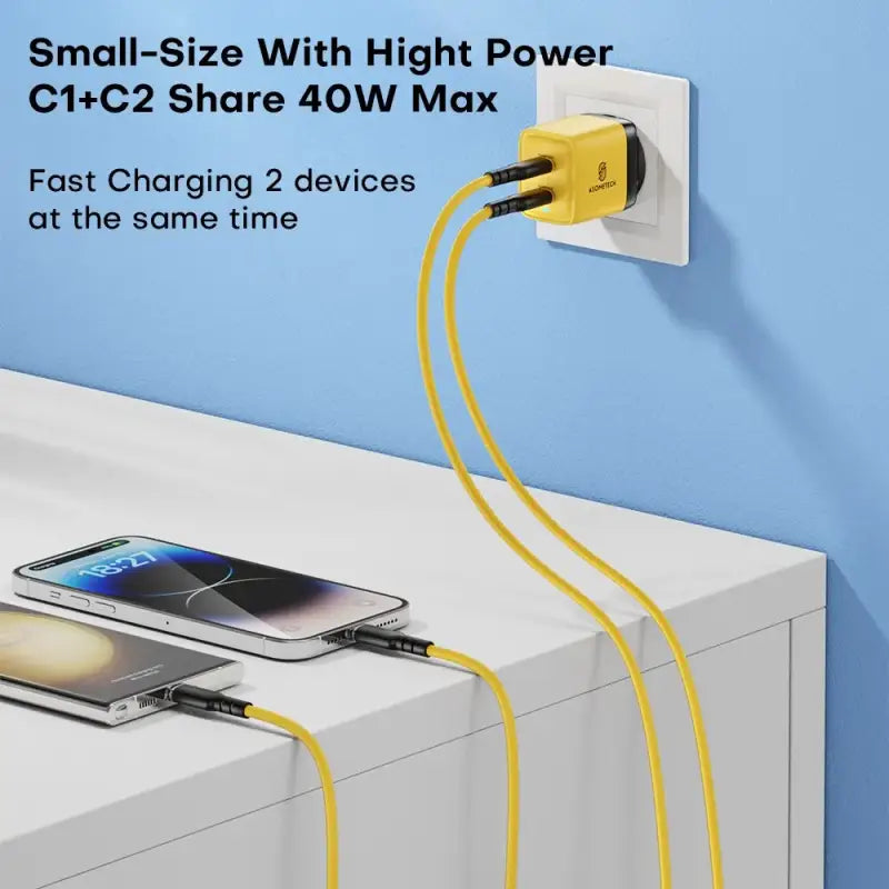 A white wall mounted charger with a yellow cord