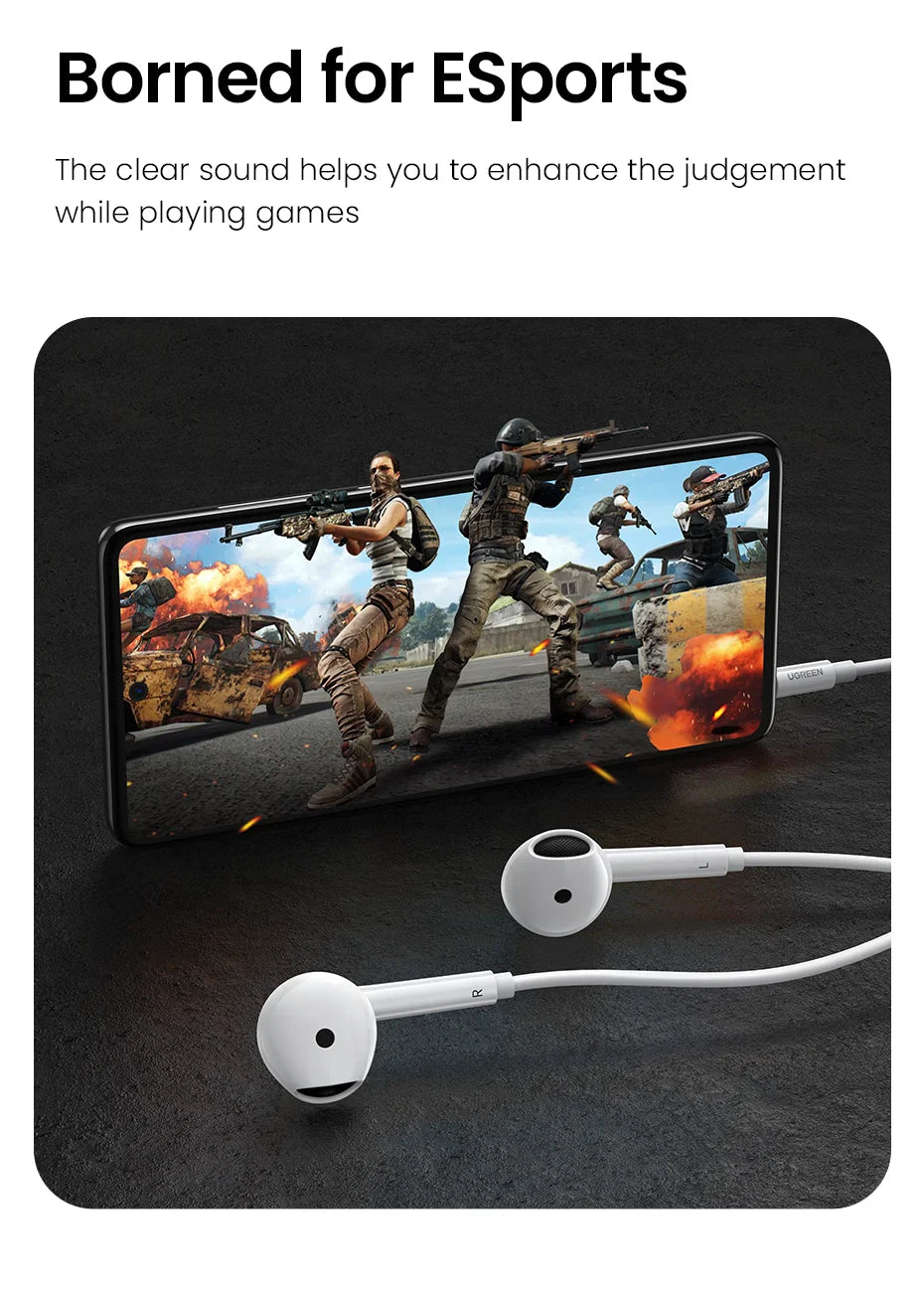 White wired earbuds connected to a smartphone displaying a video game.