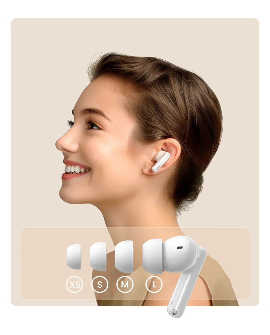 White wireless earbuds with multiple ear tip sizes.