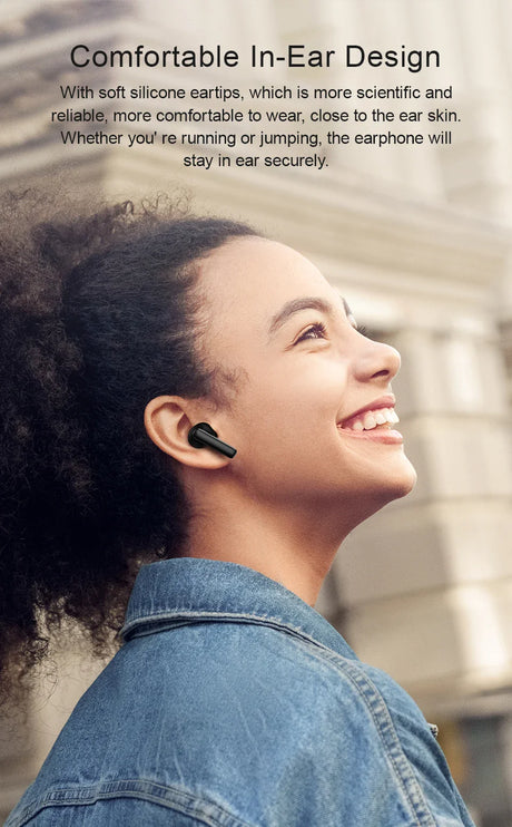 Wireless earbud in use.