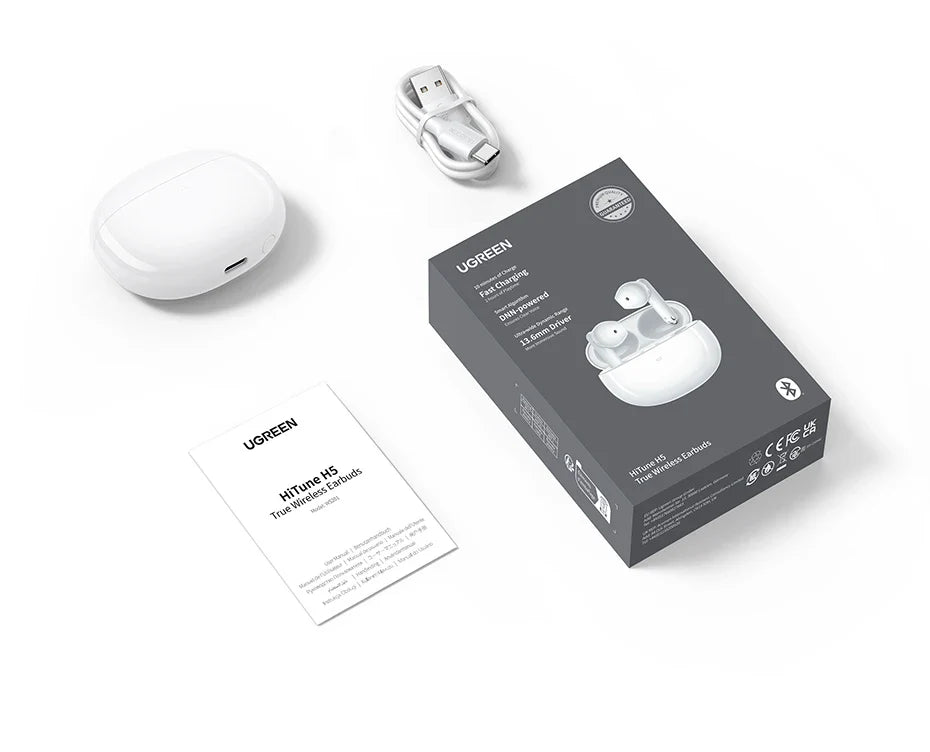 Wireless earbuds with charging case and accessories.