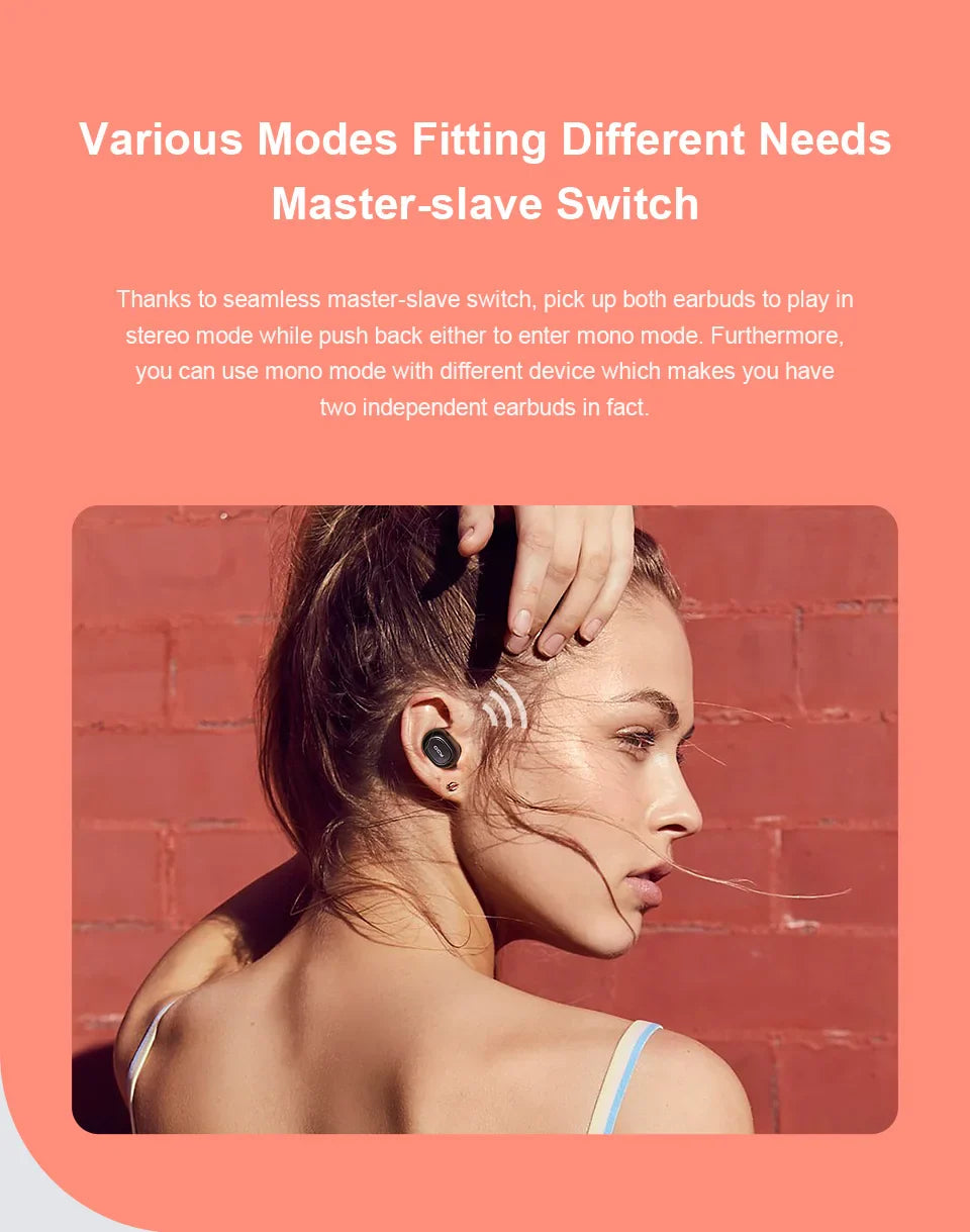 Wireless earbuds in use.