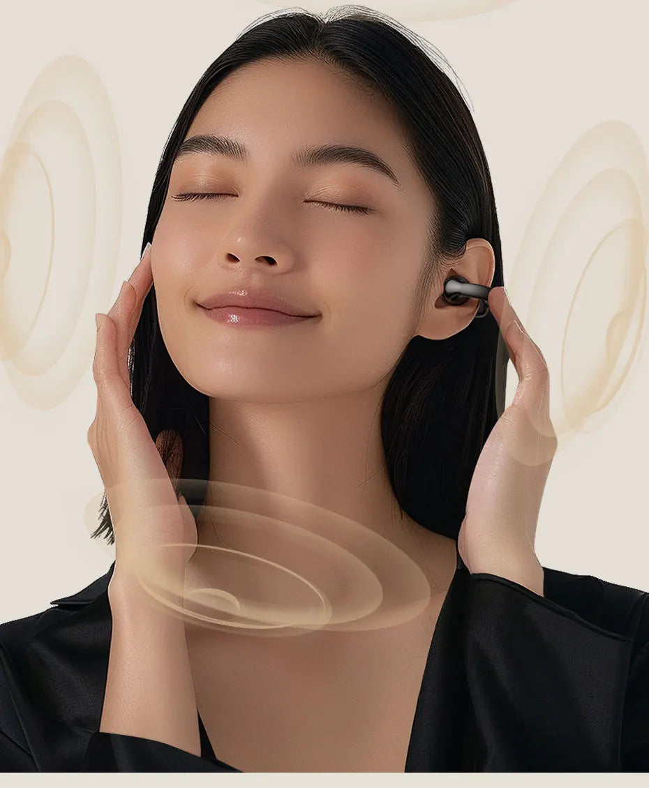 Wireless earbuds in use.