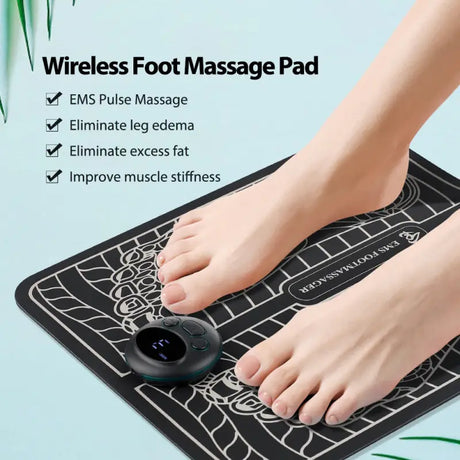 a woman’s feet on a black and white foot massage pad
