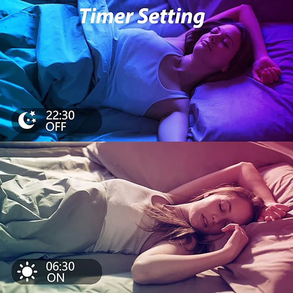 a woman laying in bed with a clock
