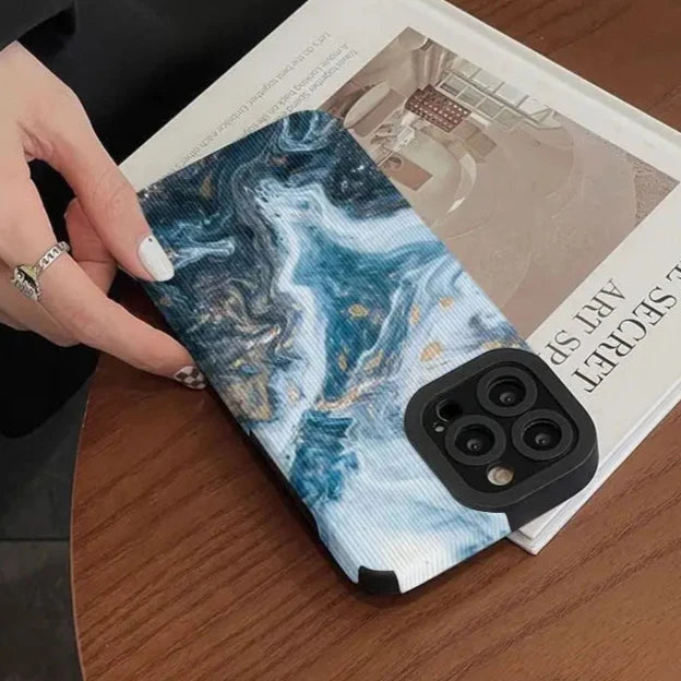 A woman holding a book on a table