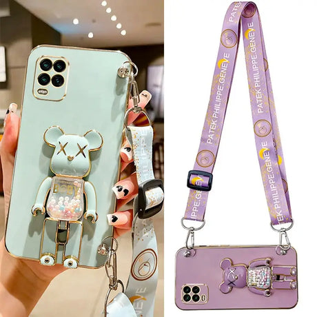 a woman holding a cell phone case with a phone strap