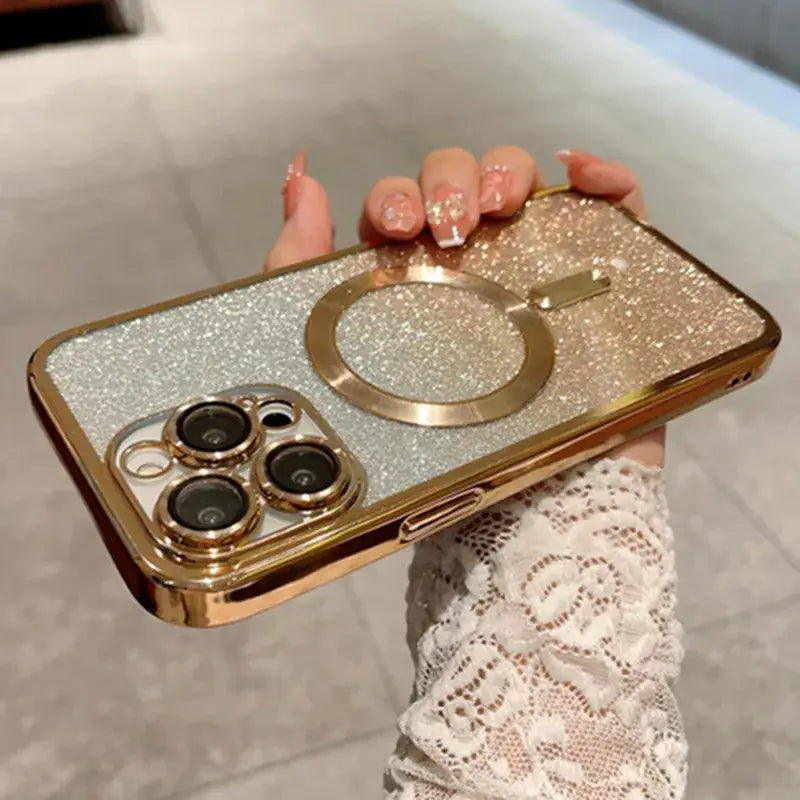 A woman holding a gold phone case with two rings