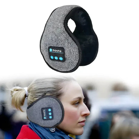 a woman wearing a headphones with a bluetooth