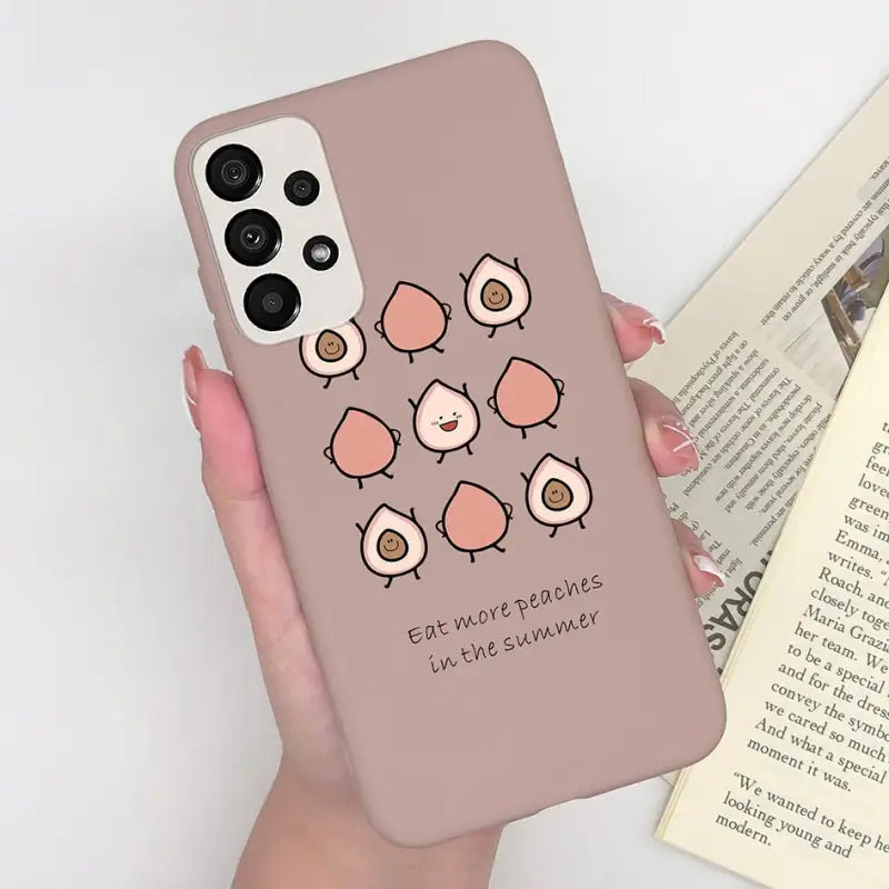a woman holding a phone case with a bird design