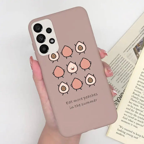 a woman holding a phone case with a bird design