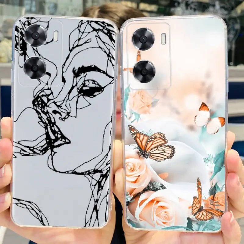 a woman holding a phone case with a butterfly and flowers