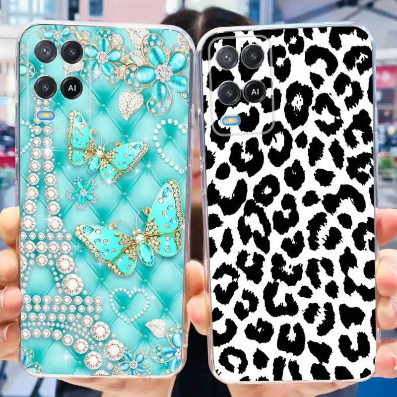 a woman holding up a phone case with a leopard print