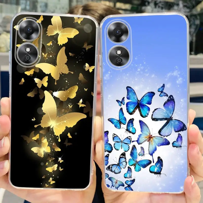 a woman holding up a phone case with butterflies on it
