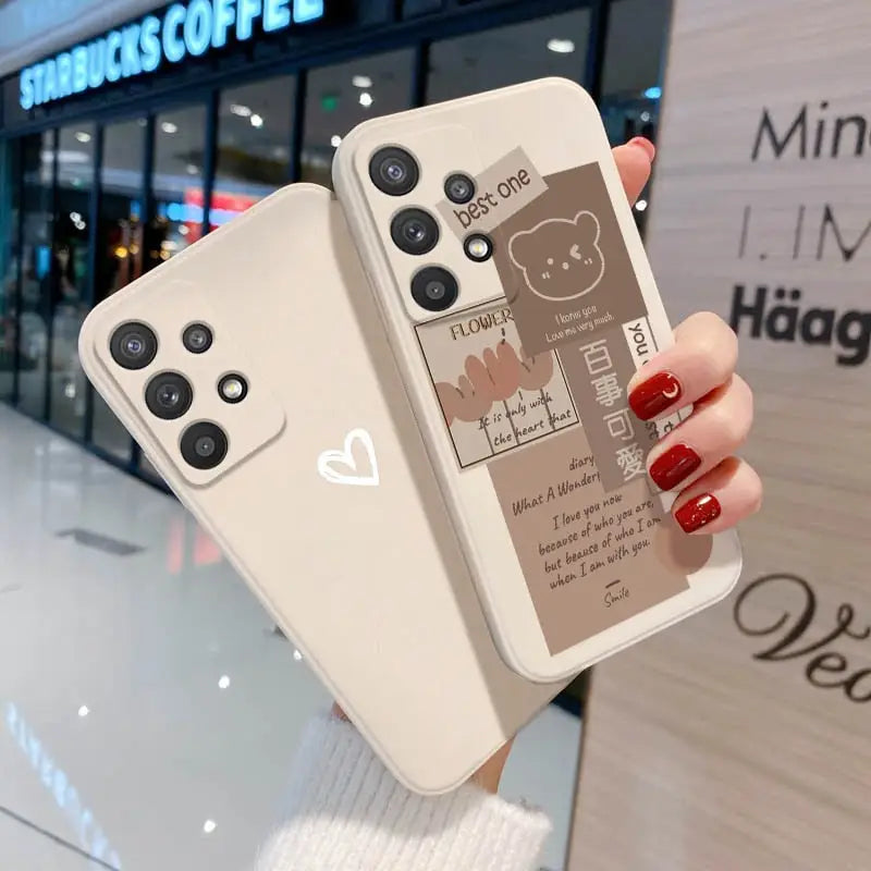 a woman holding a phone case with a picture of a dog