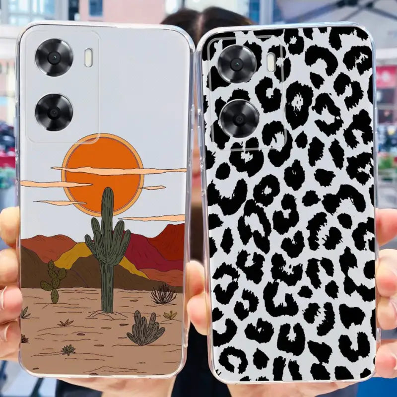 a person holding up a phone case with a desert scene
