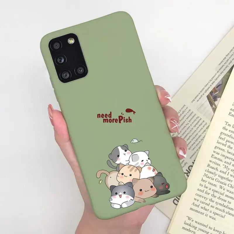 a woman holding a phone case with a cat and dog