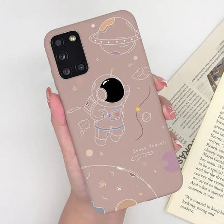 a woman holding a phone case with a cartoon character on it