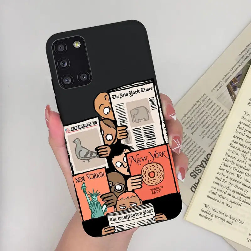 a woman holding a phone case with a cartoon character