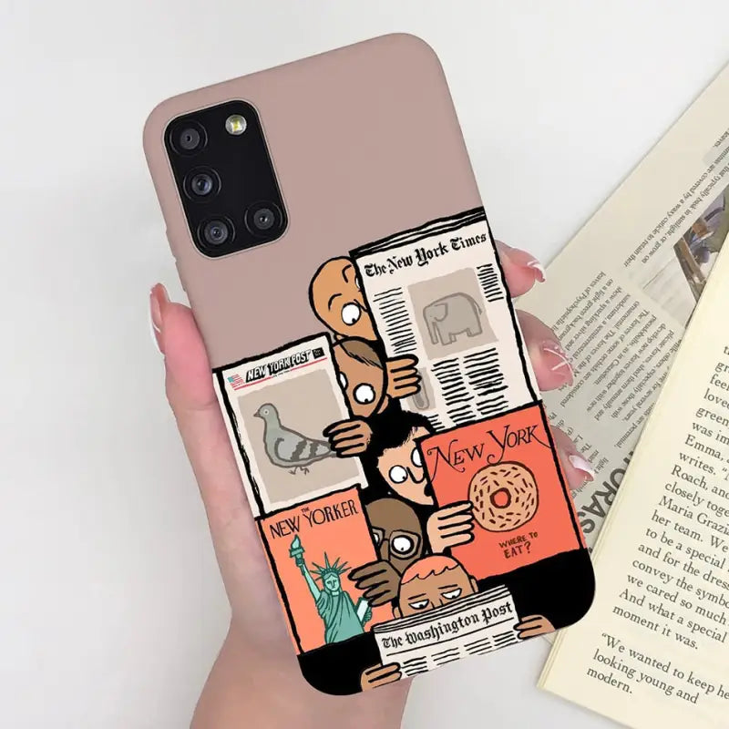 a woman holding a phone case with a cartoon character