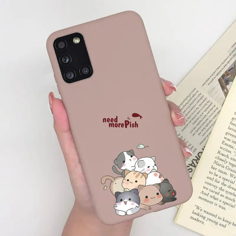 a woman holding a phone case with a cartoon cat and dog