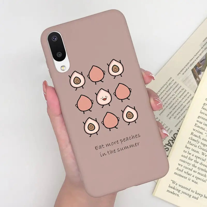 a woman holding a phone case with a bird design