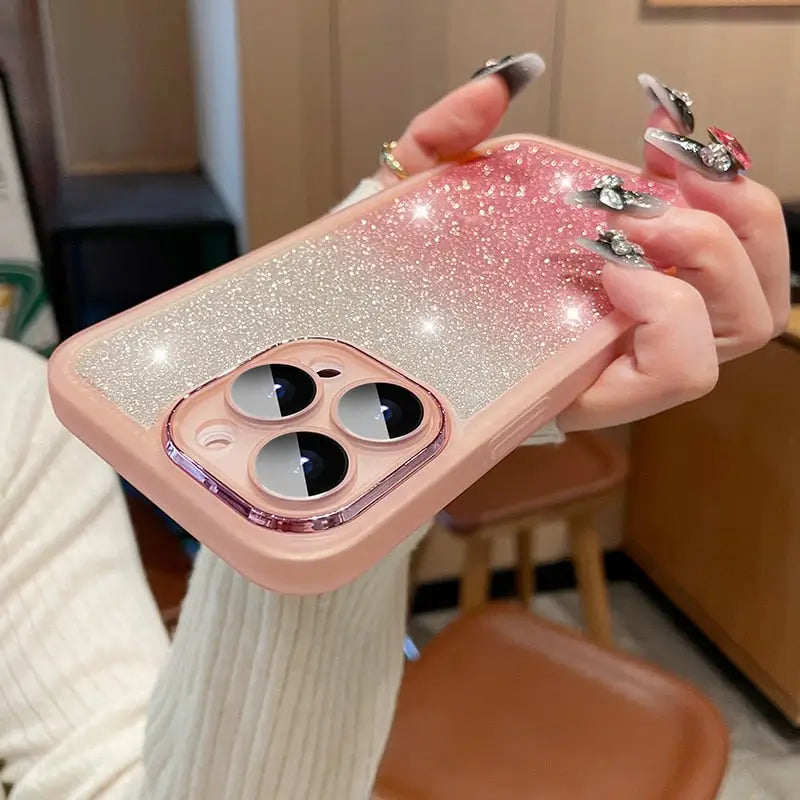 a girl holding a pink phone case with a heart shaped ring