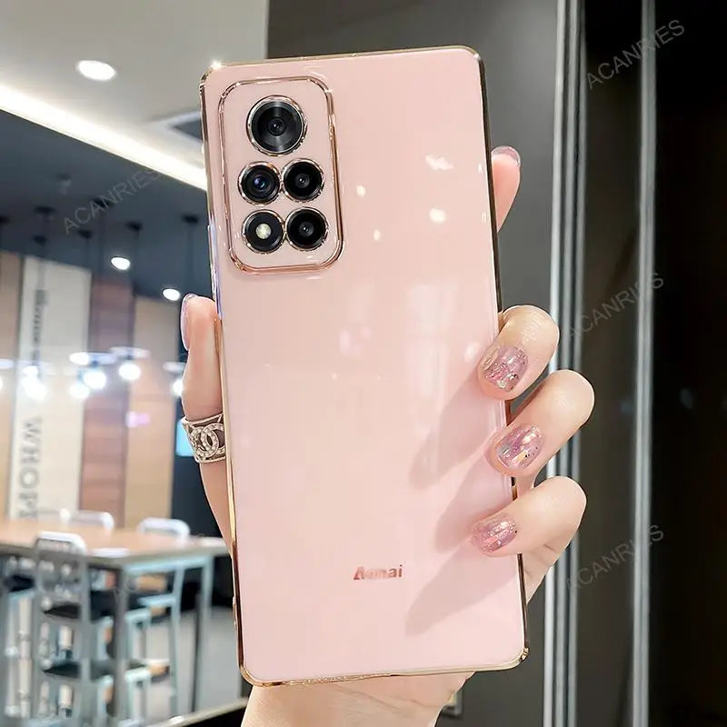 a woman holding a pink iphone case