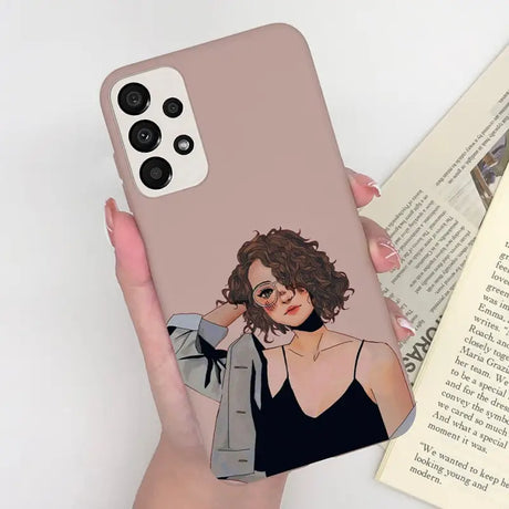 a woman holding a pink phone case with a picture of her