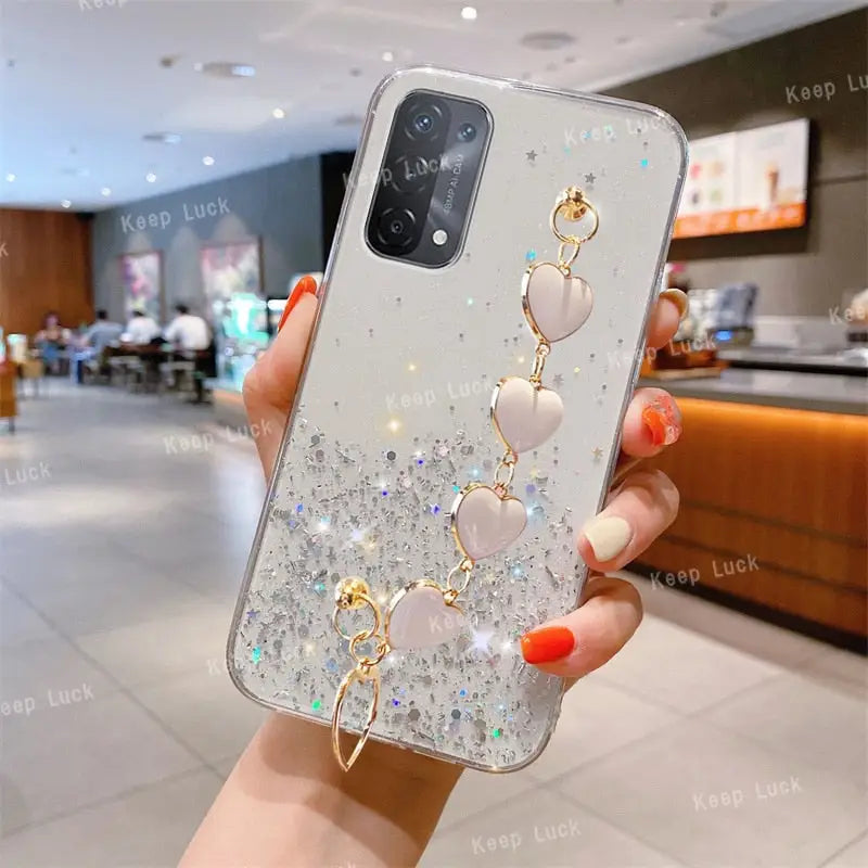 a woman holding a phone case with a phone holder