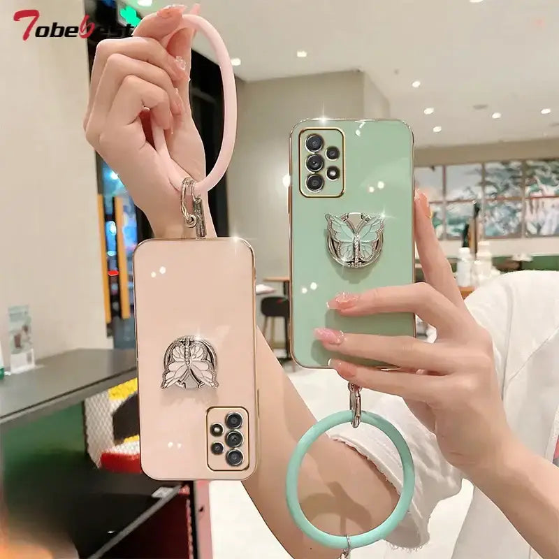 A woman holding a phone case with a ring