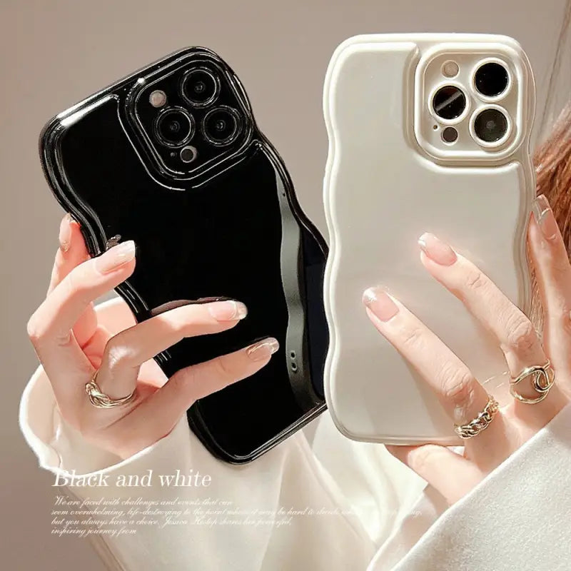 a woman holding a phone case with a ring