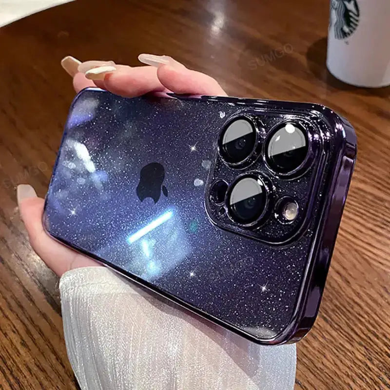 A woman holding a phone case with a star design