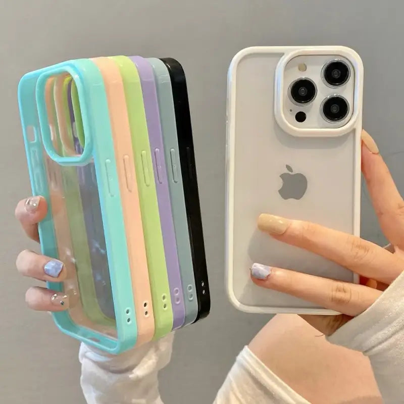 A woman holding a phone case with a phone in it