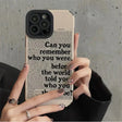 a woman holding a phone case with the words, ` you were the world β
