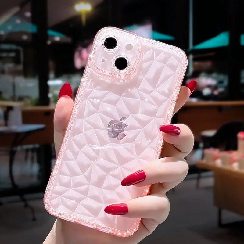 A woman holding a pink phone case