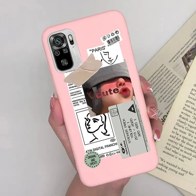 a woman holding a pink phone case with a picture of her face