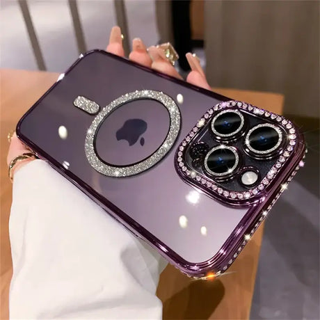 a woman holding a purple iphone case with a diamond ring